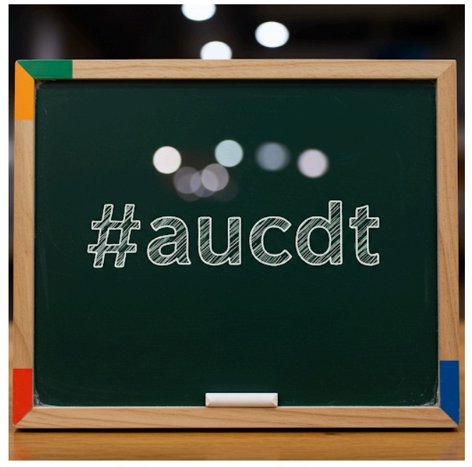 AUCDT on Blackboard: A Conversation with AI