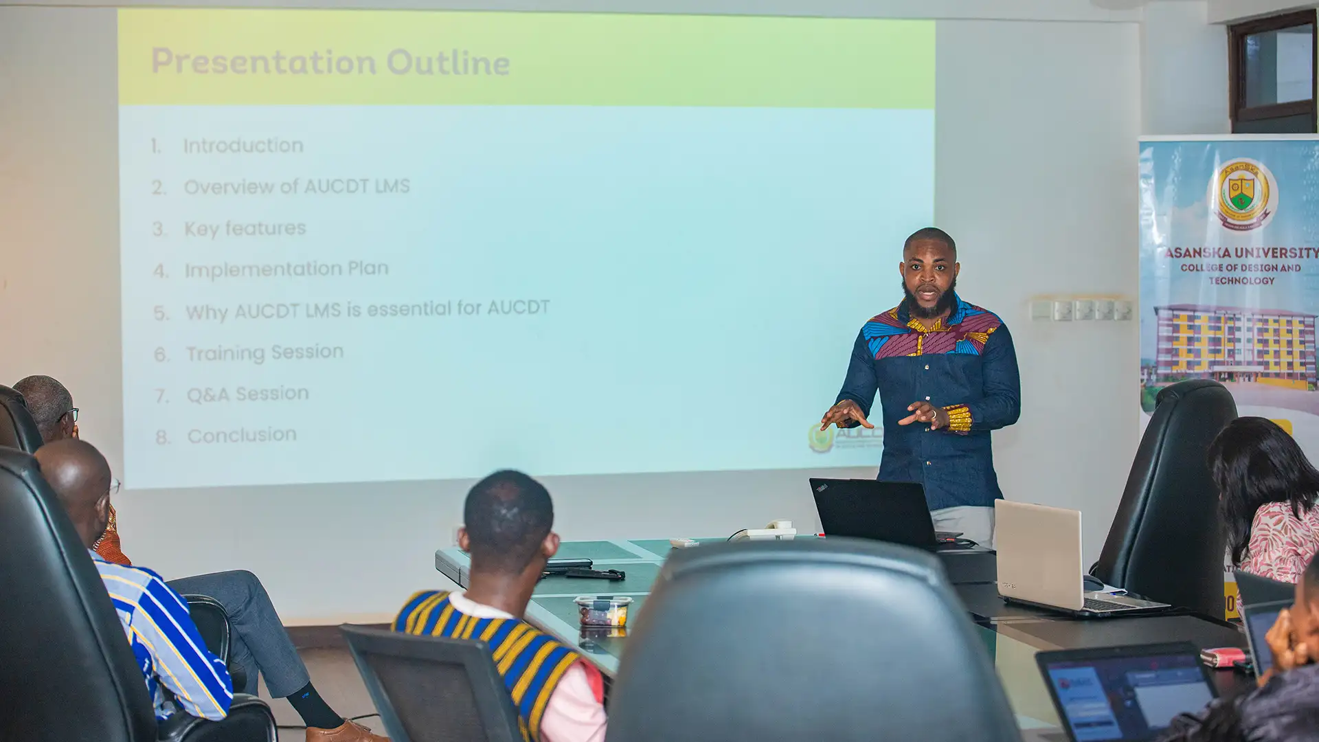 Mr. Bright Senanu Agbosu presenting during the launch of the AUCDT LMS